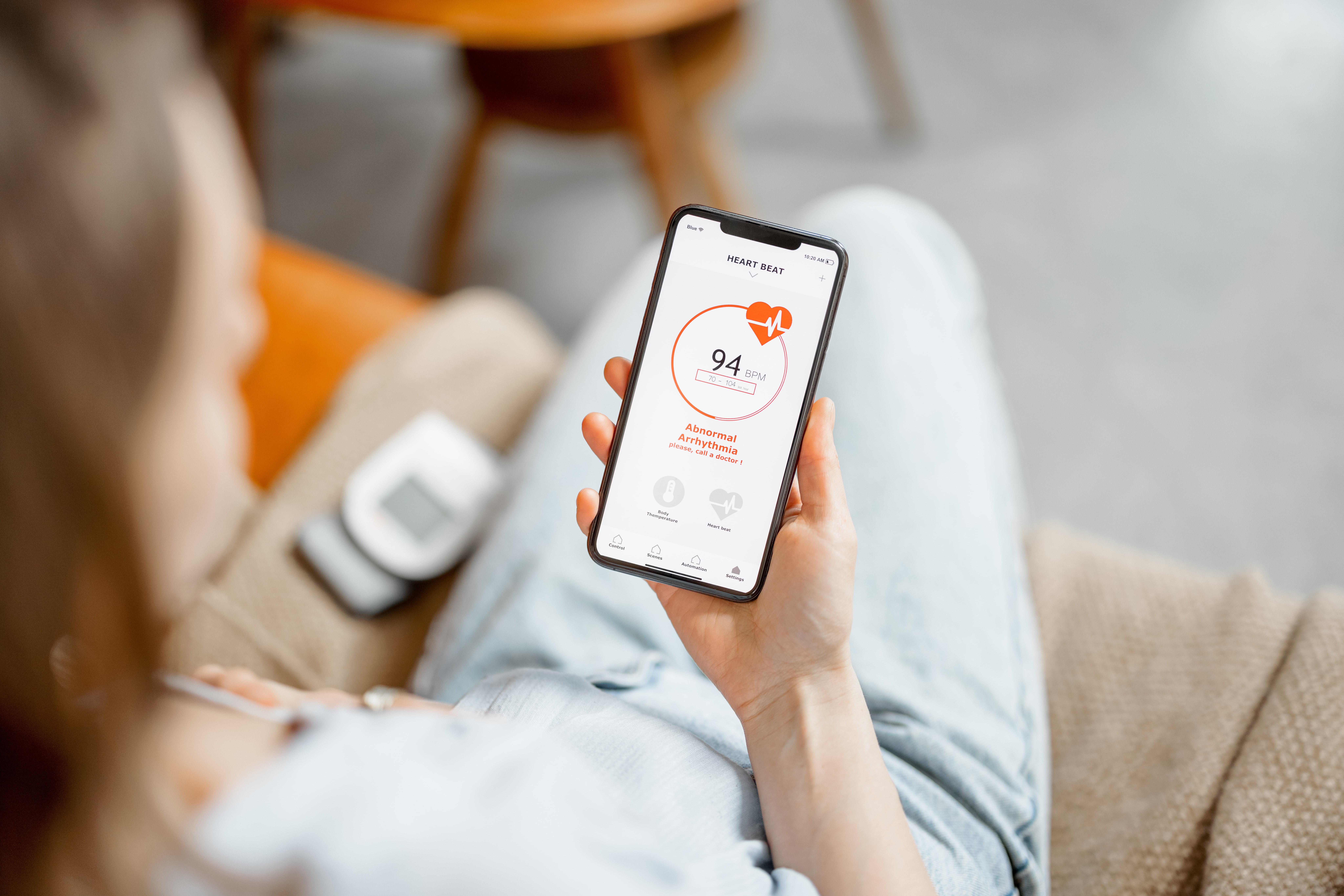 Woman measure heart rate with smart technology